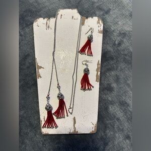 36 inch Brighton lariat necklace and matching earrings. It is red and silver.